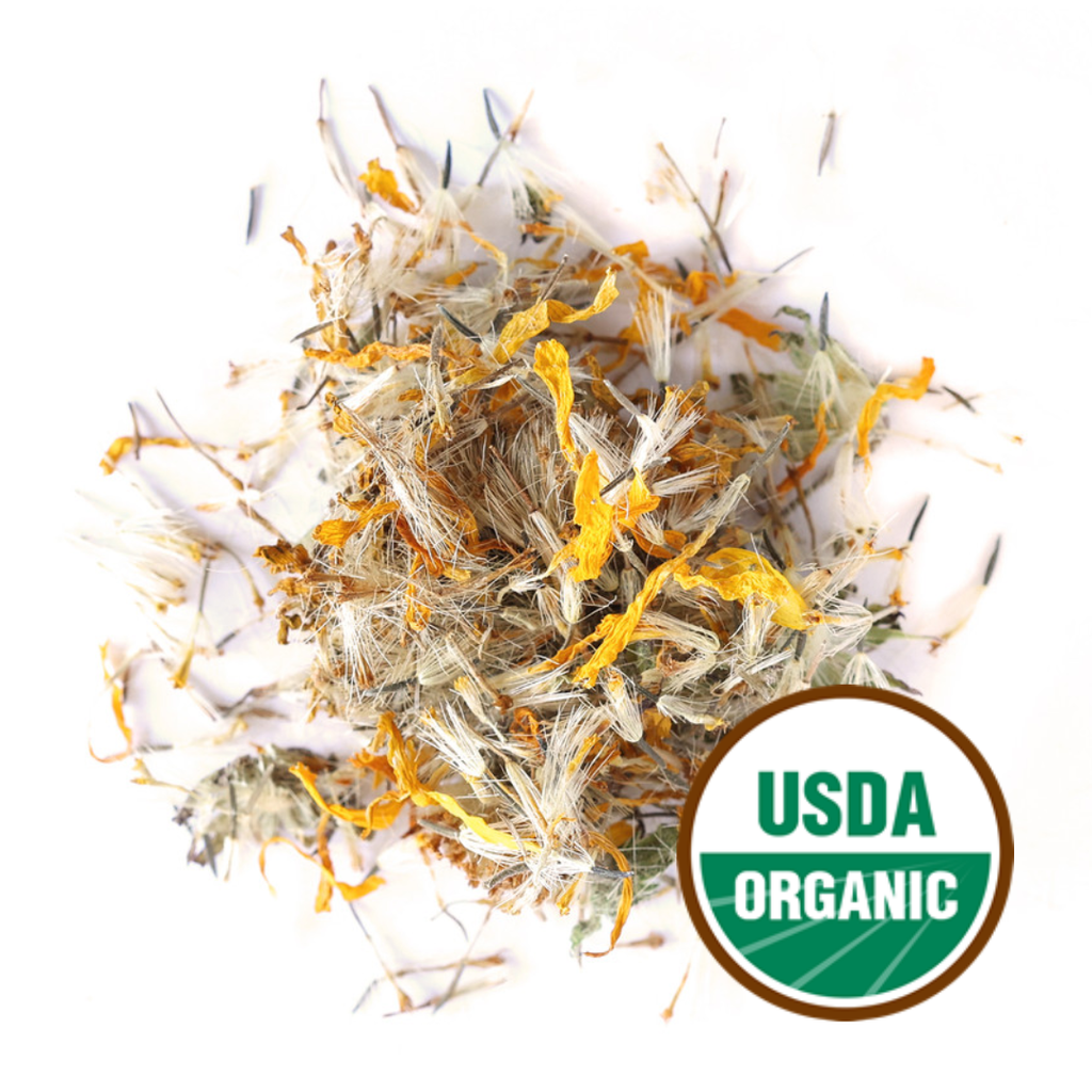 A pile of dried Arnica montana flowers, featuring yellow petals and white, feathery seed heads. The image includes a USDA Organic seal, indicating the product's certification. The composition is set against a clean white background, highlighting the natural colors.